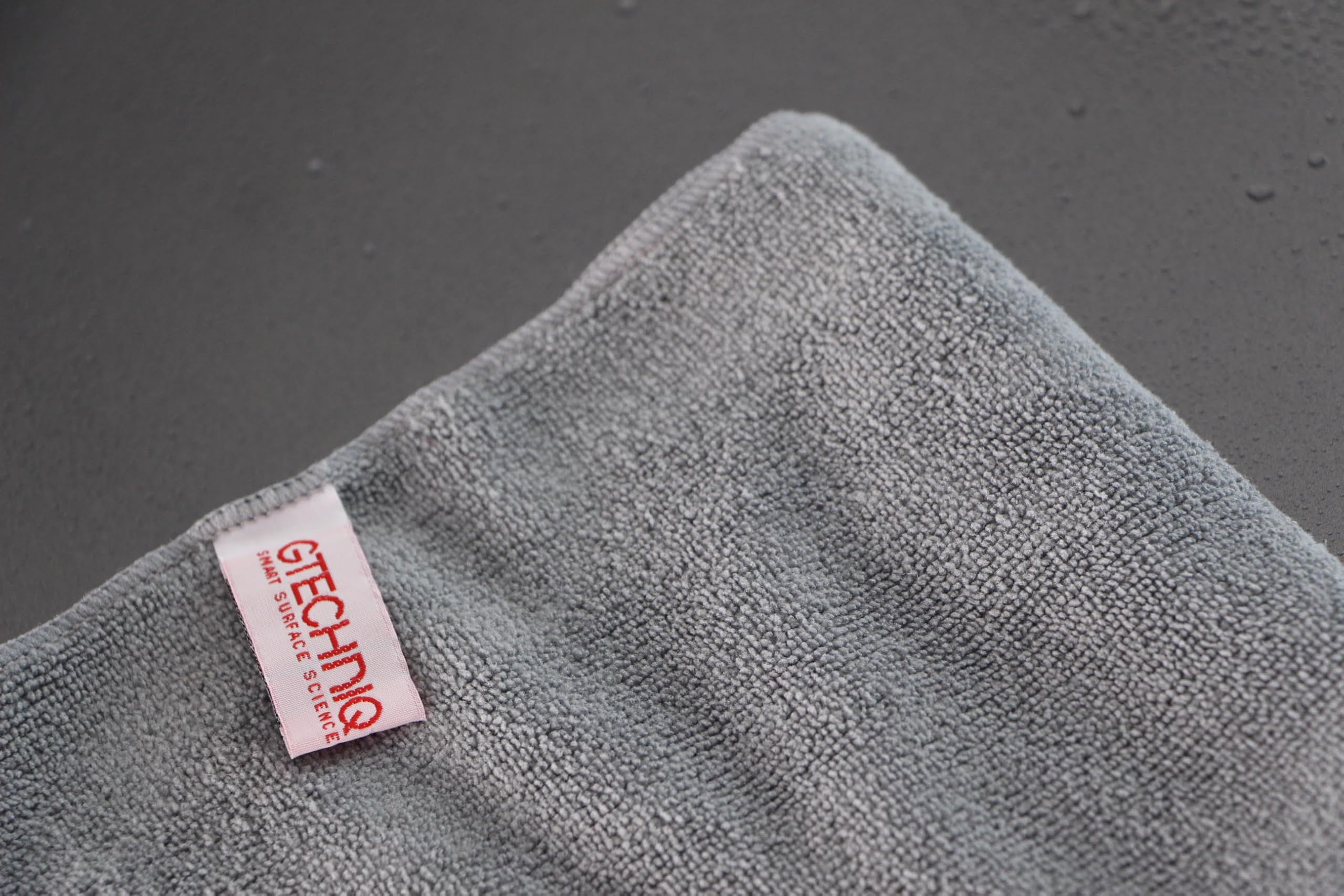 Gtechniq MF1 wash-care label close-up explaining proper maintenance tips
