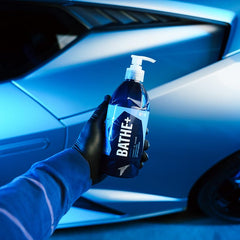 Gyeon Bathe+ creating rich foam on a wash mitt to protect paint