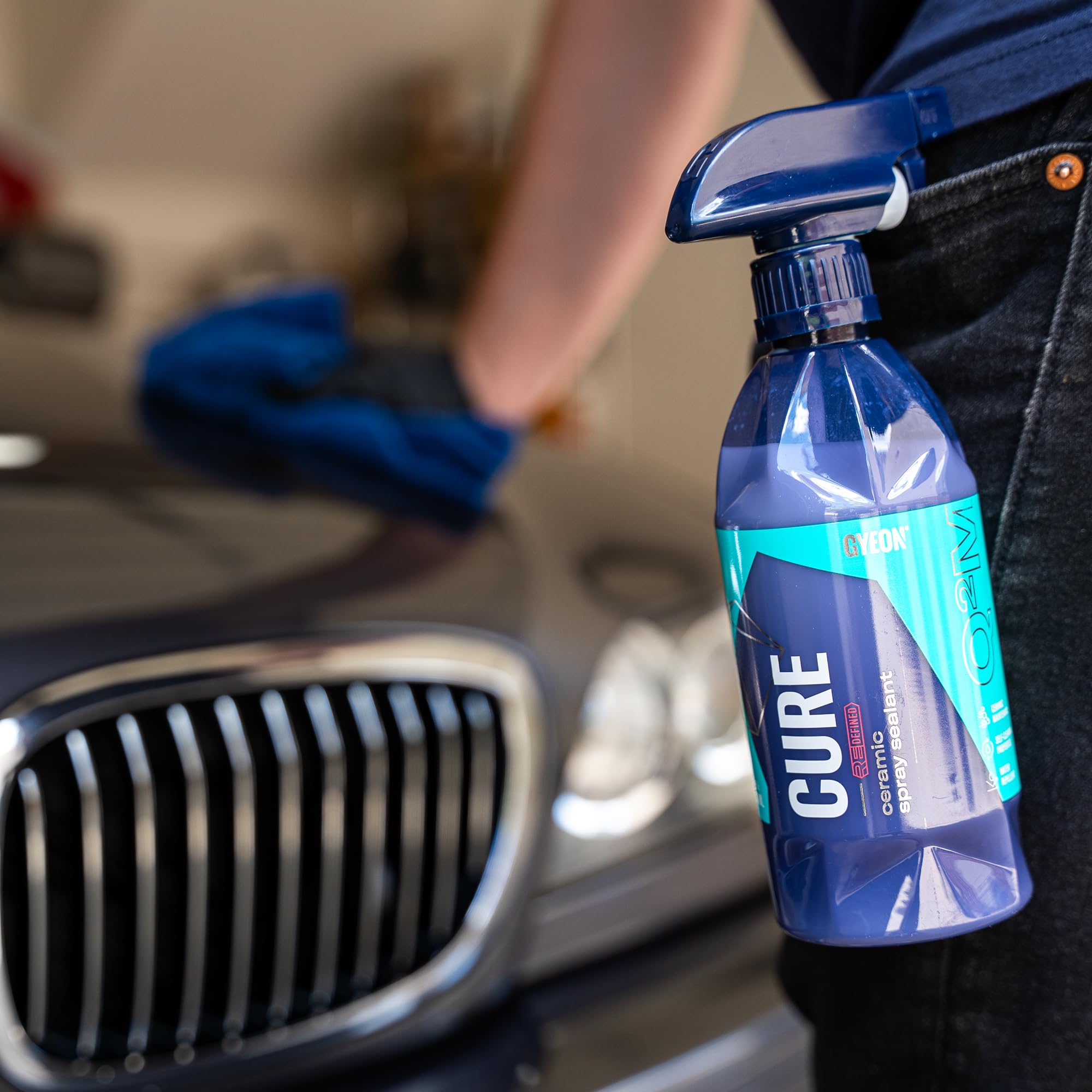 Gyeon Cure water beading on black paint demonstrating hydrophobic effect