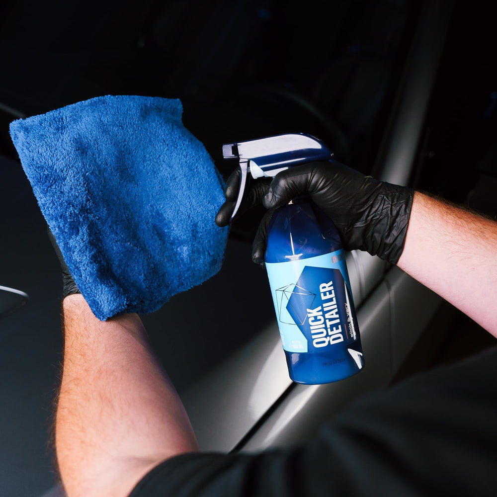 Gyeon being wiped with microfiber to remove dust and fingerprints