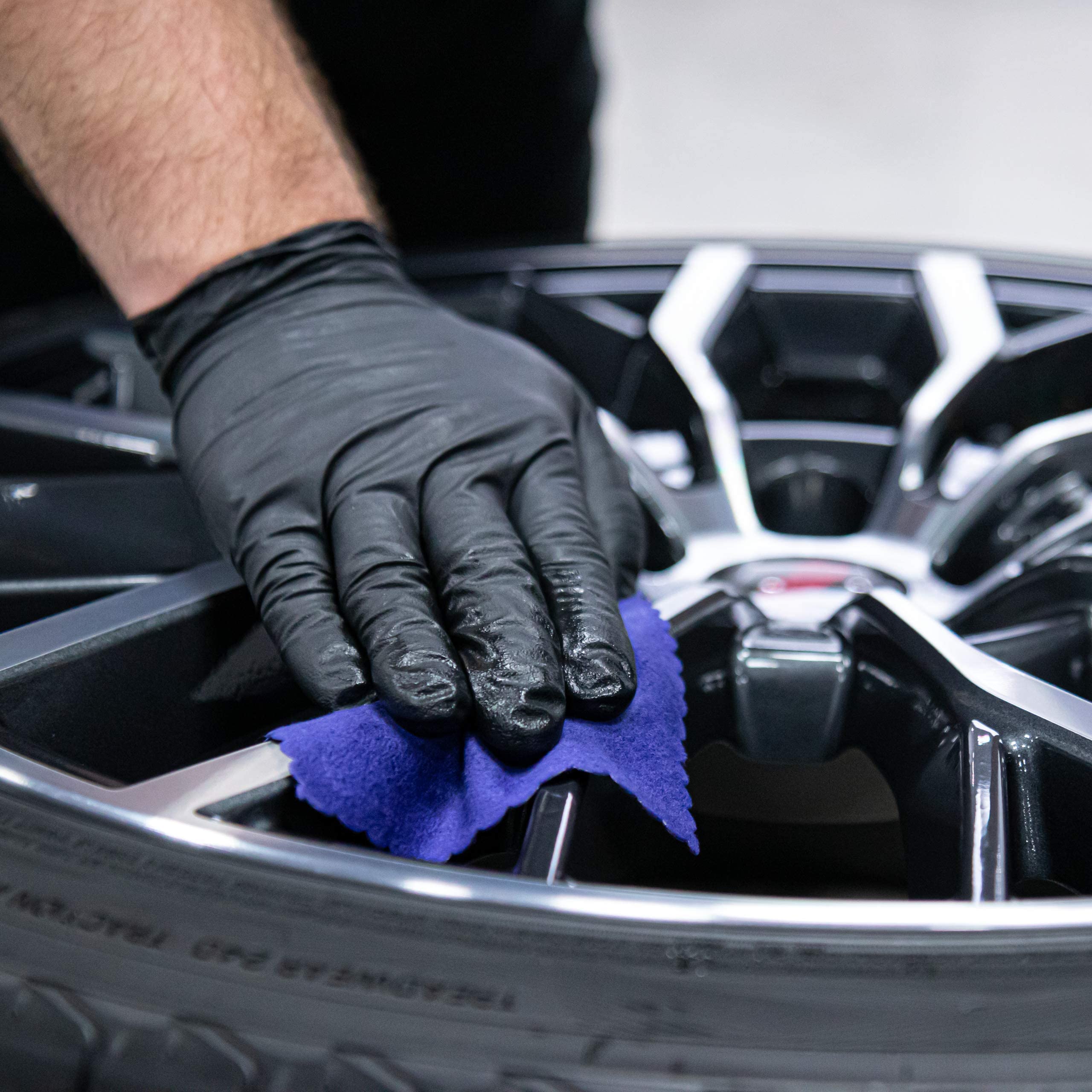 Side-by-side before and after wheels treated with Gyeon Rim showing easier cleaning