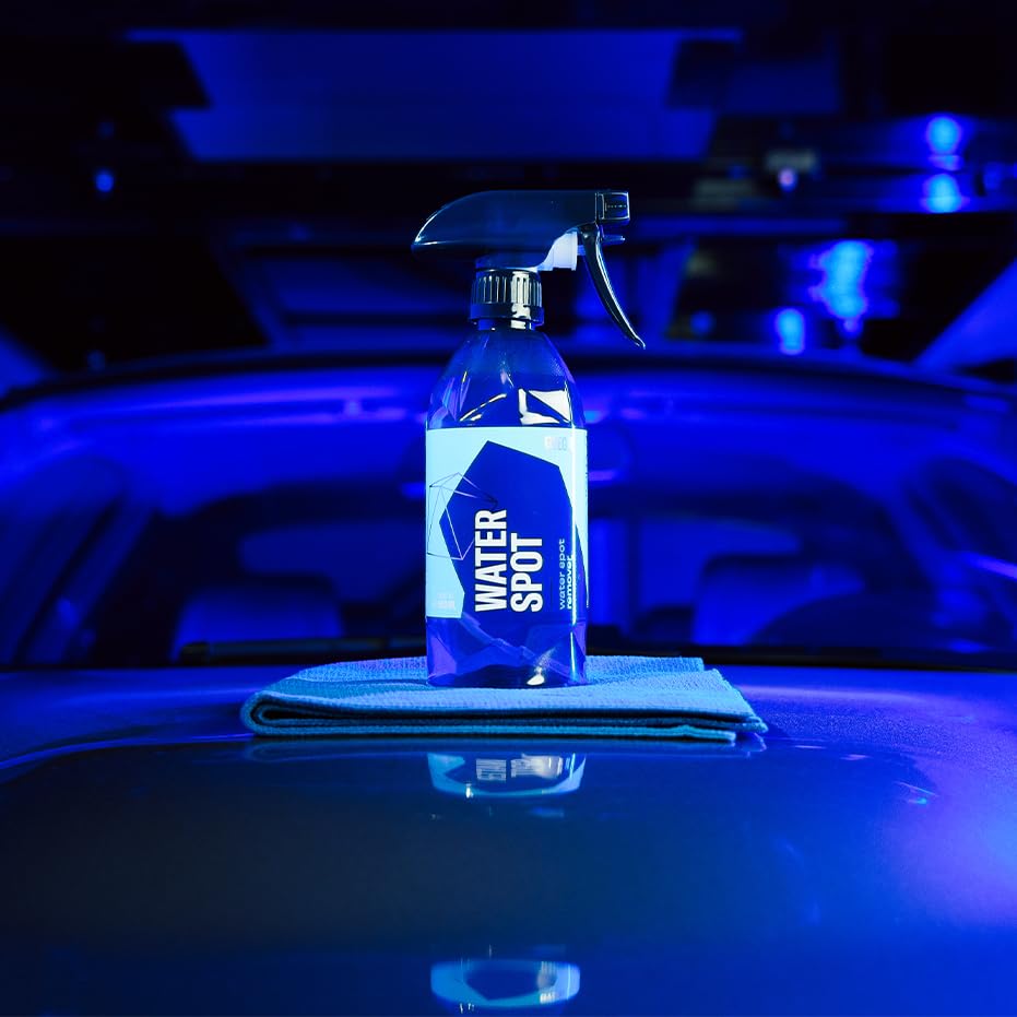 Gyeon bottle next to measuring cap displaying concentrated formula and dosage control