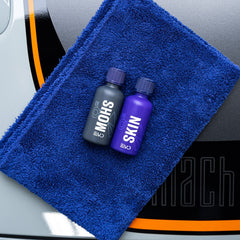Gyeon Syncro kit laid out with applicator and accessories for controlled application