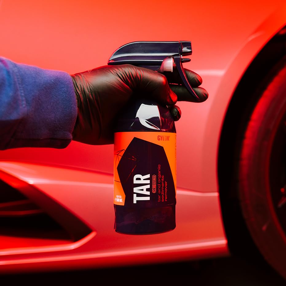Gyeon tar remover alongside detailing tools in kit for professional results