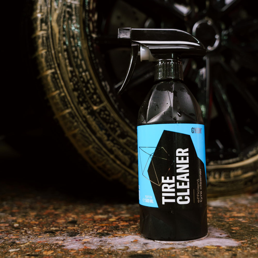 Gyeon applied on tire sidewall revealing deep-cleaning effect before dressing