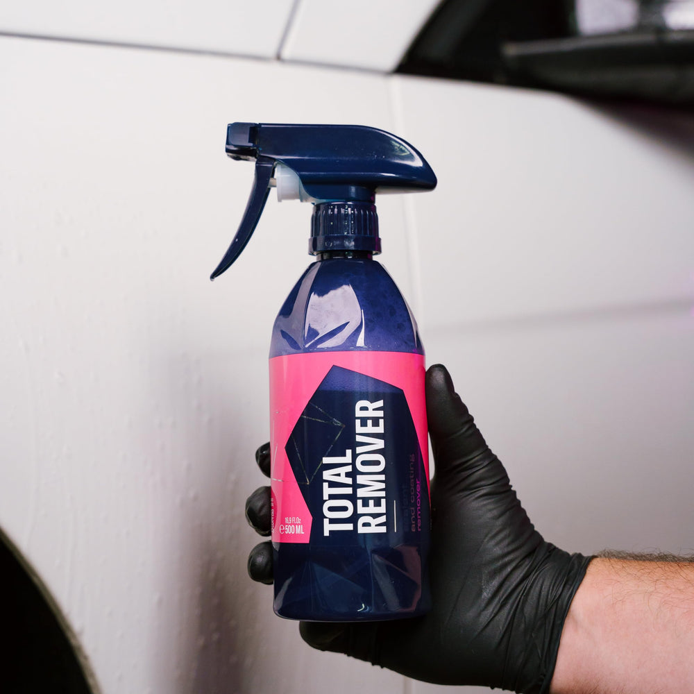 Gyeon TotalRemover rinsing off painted panel demonstrating fast rinse-off benefit