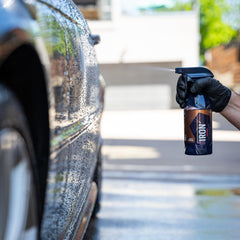 Wet vehicle hood treated with GYEON indicating safe cleaning of painted panels