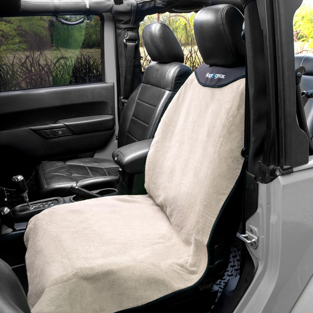 HAPPEGEAR in a car with beach gear showing sand and salt defense