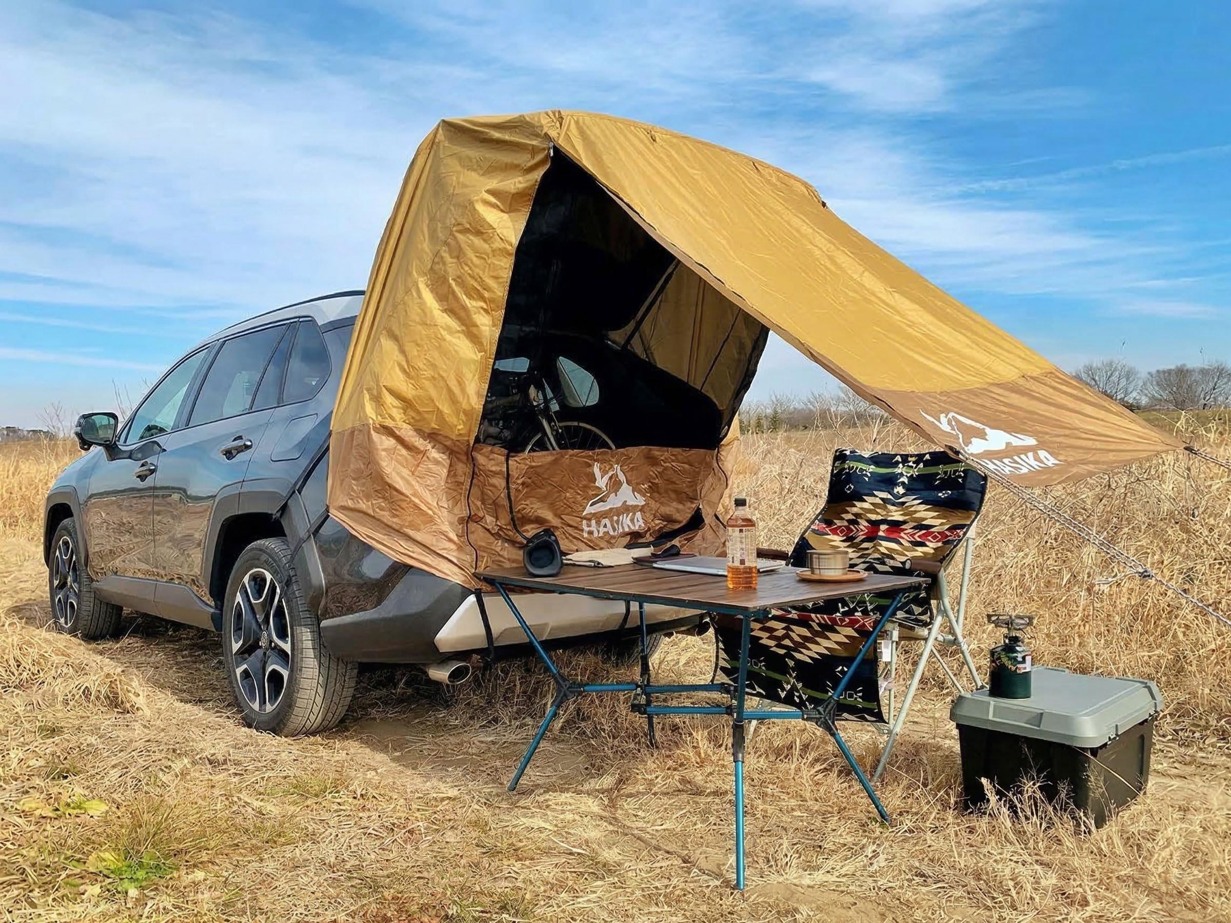 HASIKA next to camping chair showing scale and coverage for gear