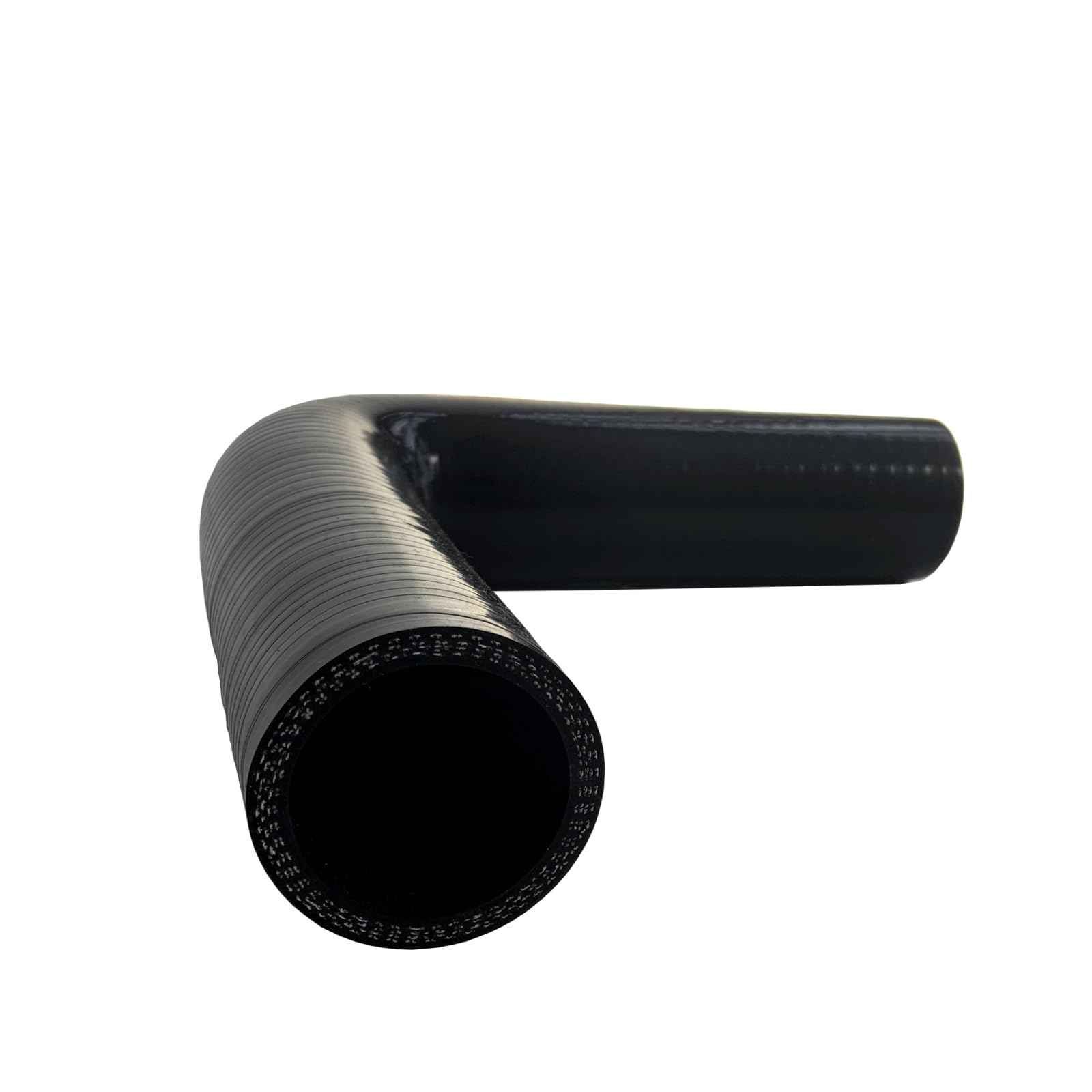 Haturmyko elbow fitted under hood in engine bay illustrating heat resistance benefit