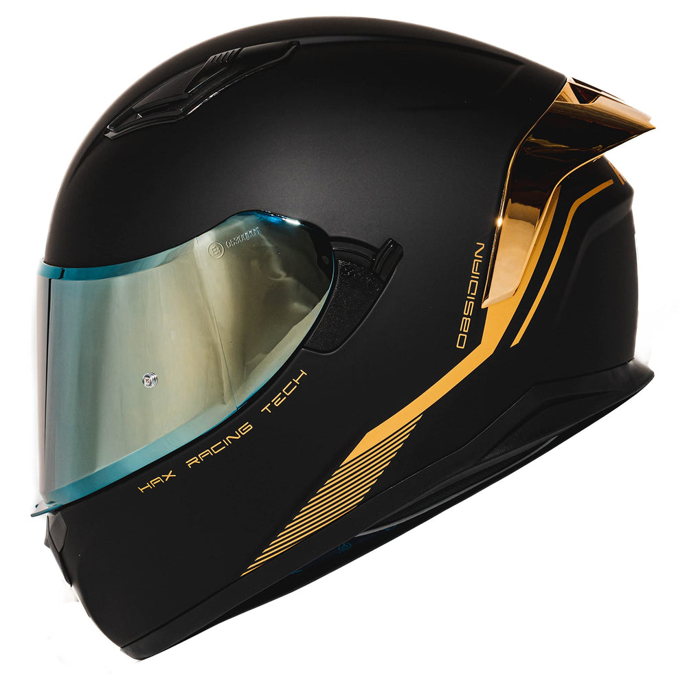 HAX Obsidian front view showing matte black gold finish and clear visor protection