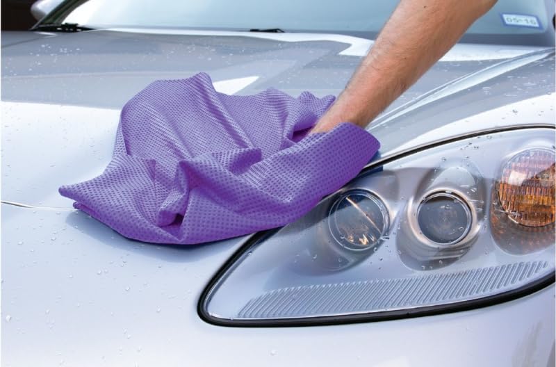 HI-TECH towel held in hand to show scale and ergonomic coverage for faster drying