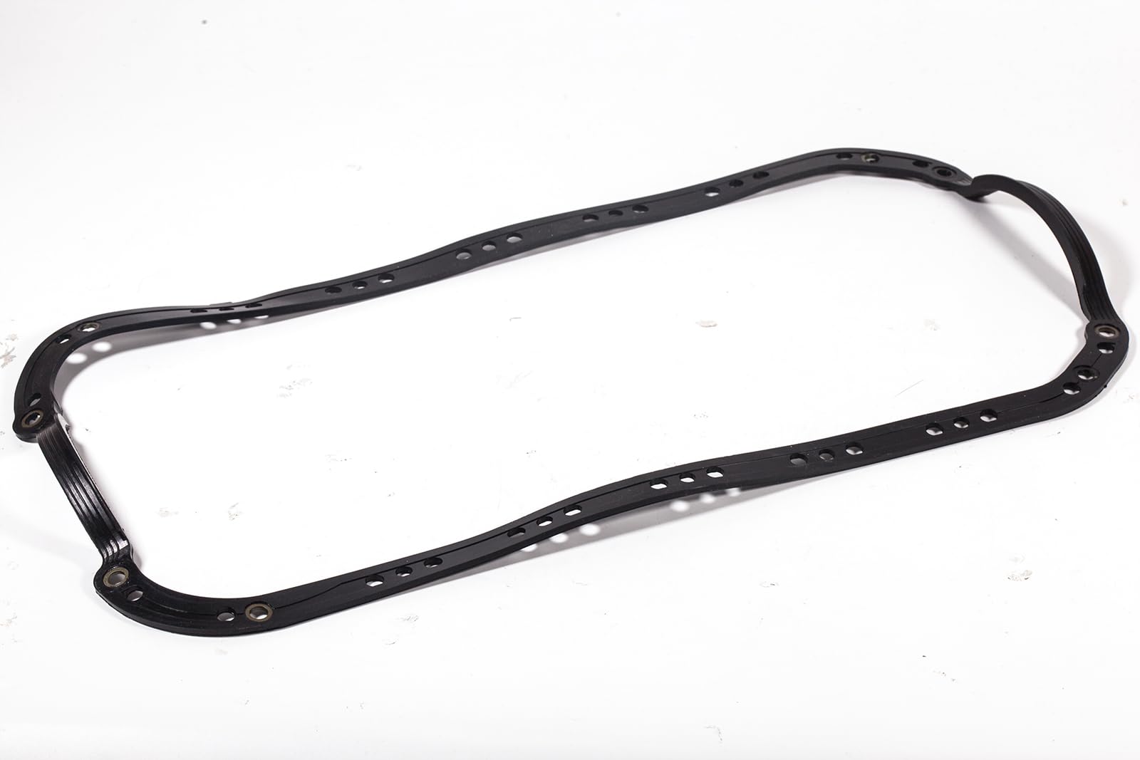 HIHIAV gasket fitted next to engine for scale comparison, helps confirm correct part