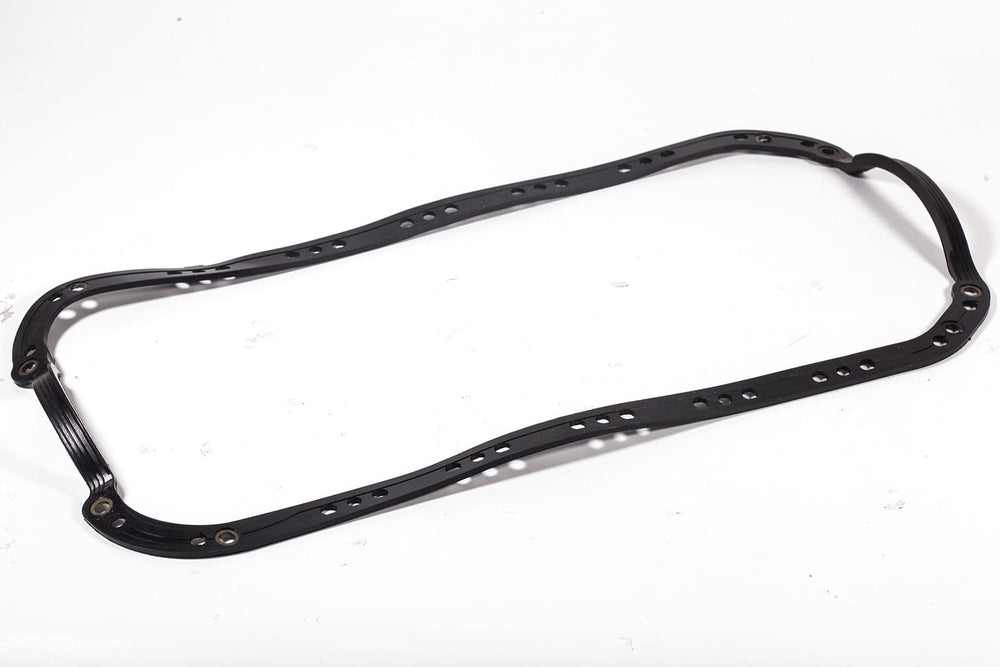 HIHIAV gasket fitted next to engine for scale comparison, helps confirm correct part