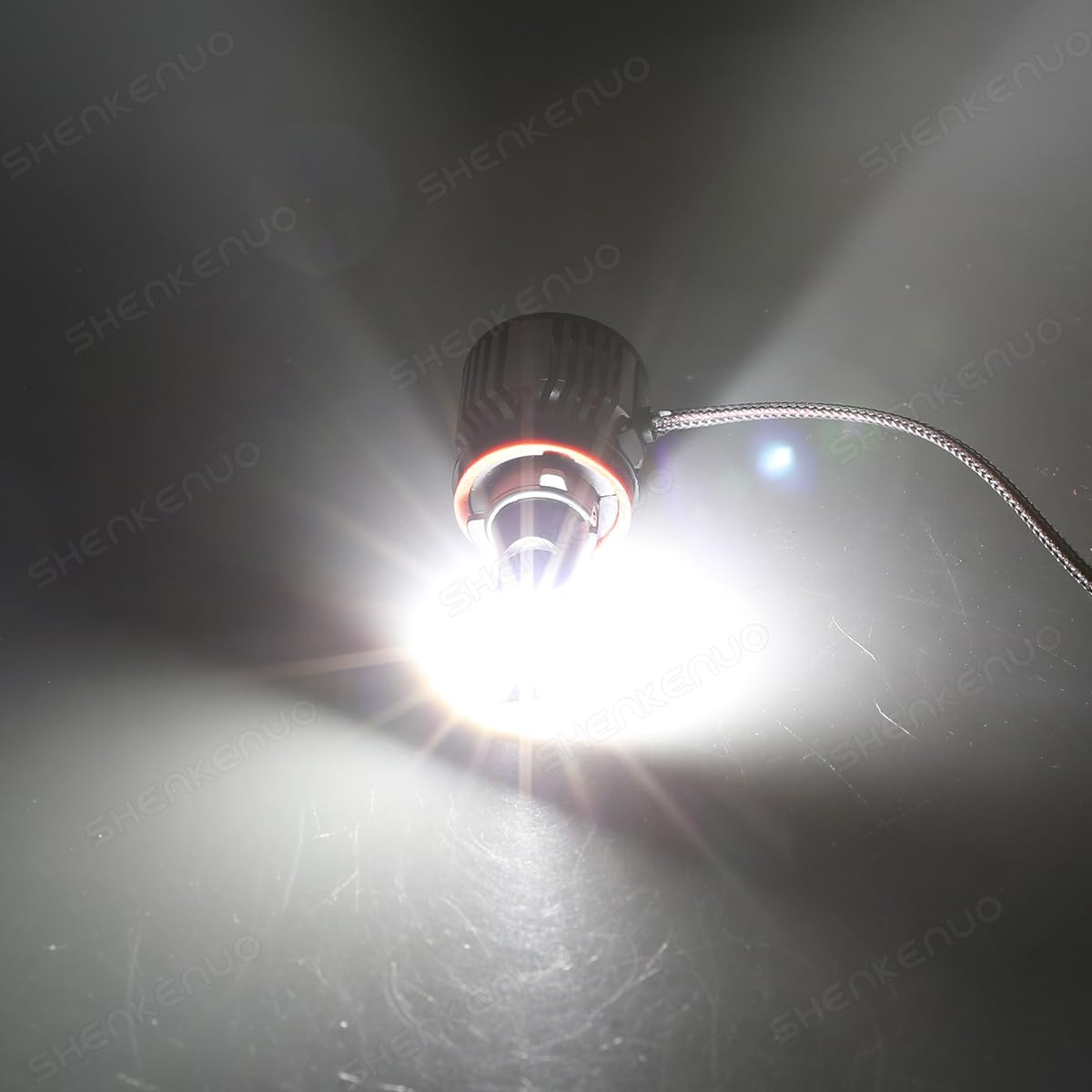 HOEDUI beside stock halogen bulb showing compact size and modern upgrade