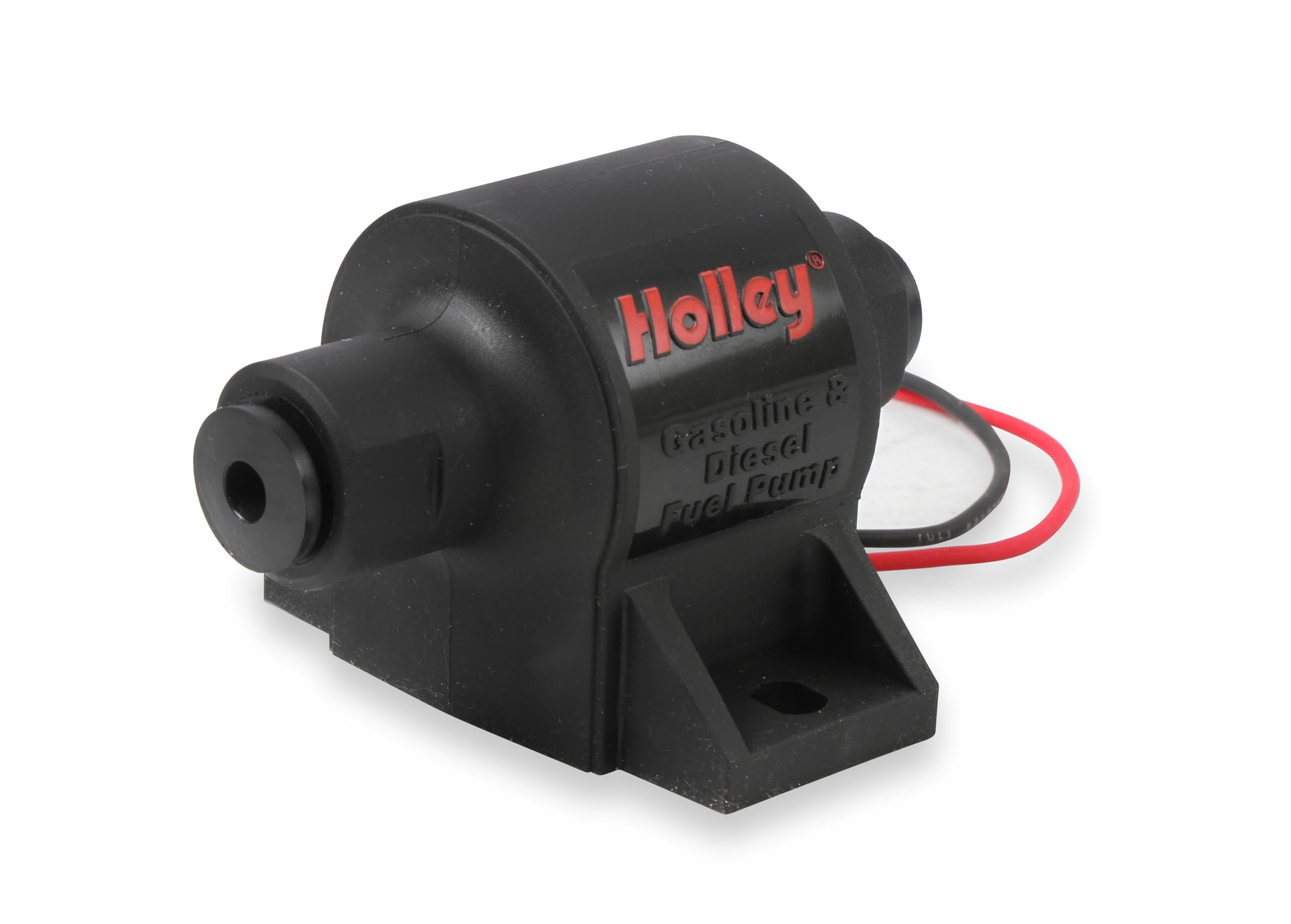 Holley next to a ruler showing compact size for tight mounting areas