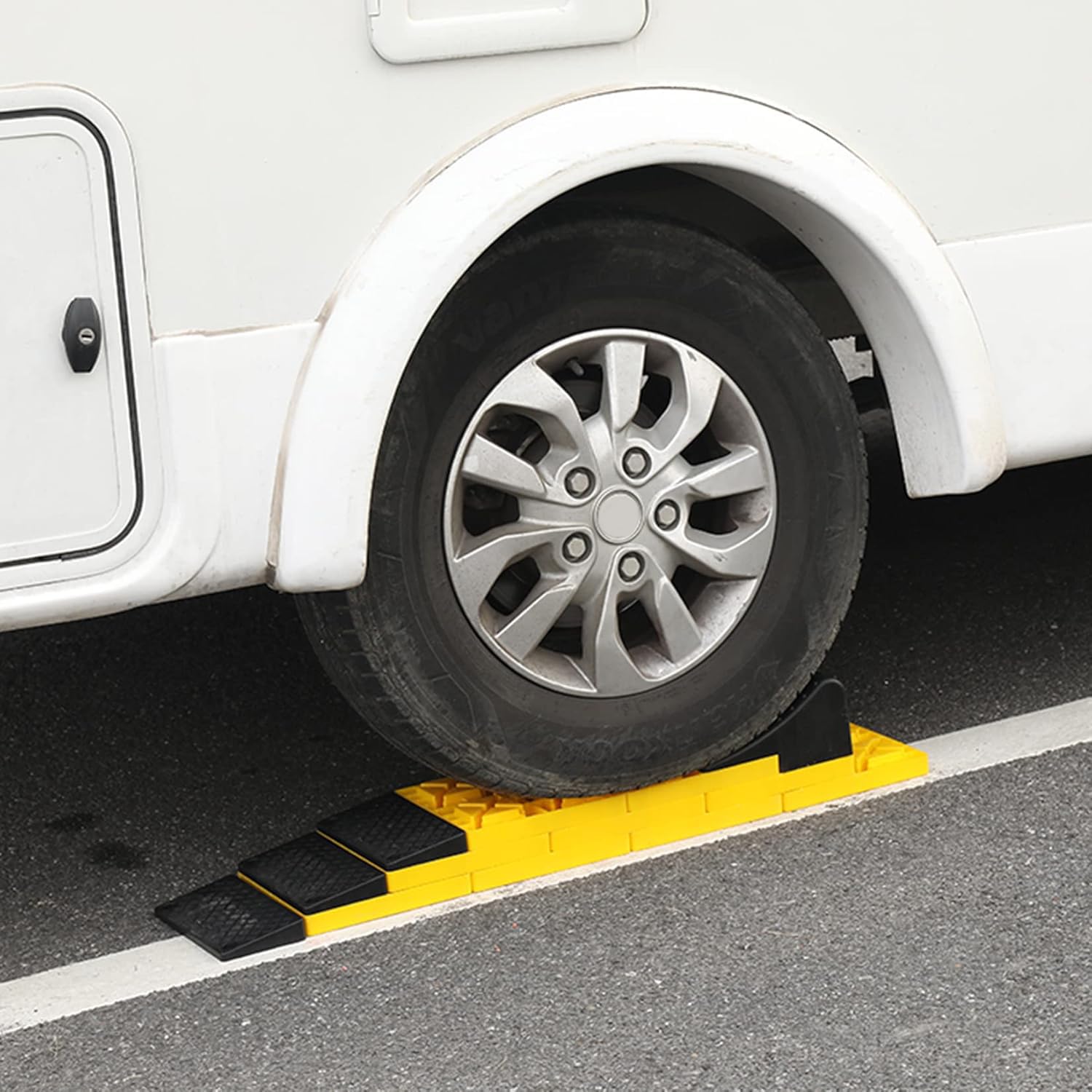 Homeon Wheels blocks in use under RV wheel providing stable, non-sinking support