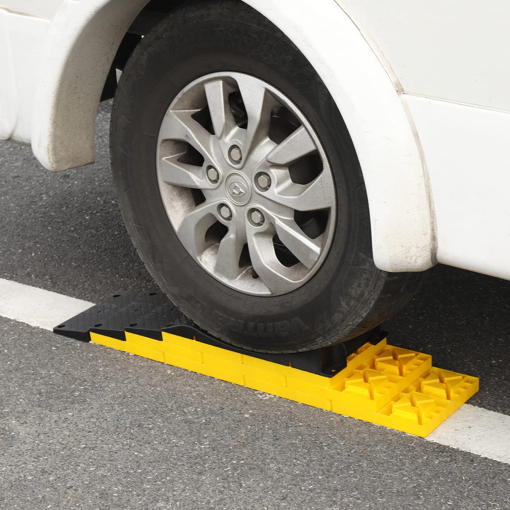 Homeon Wheels blocks in use under RV wheel providing stable leveling on campsite