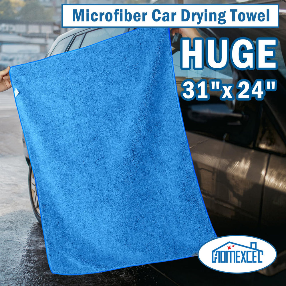 HOMEXCEL towel held in hand to show 31x24 size and coverage