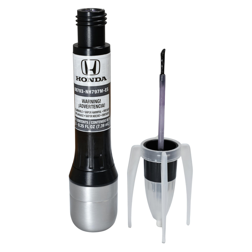 Honda pen being applied to a car door edge for quick chip repair