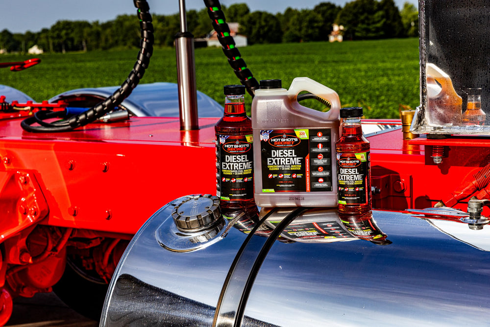 Hot Shot's Secret one-gallon container beside common household items