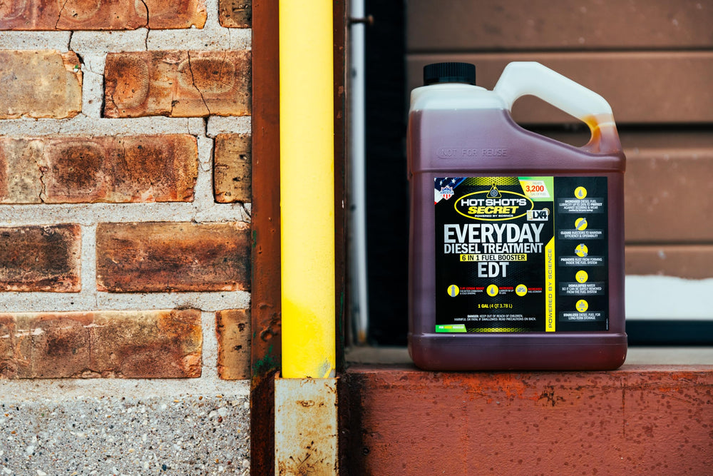 Hot Shot's Secret EDT being added at a truck fuel cap for convenient maintenance