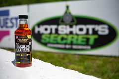 Hot Shot's Secret being poured into a vehicle fuel tank to restore fuel flow