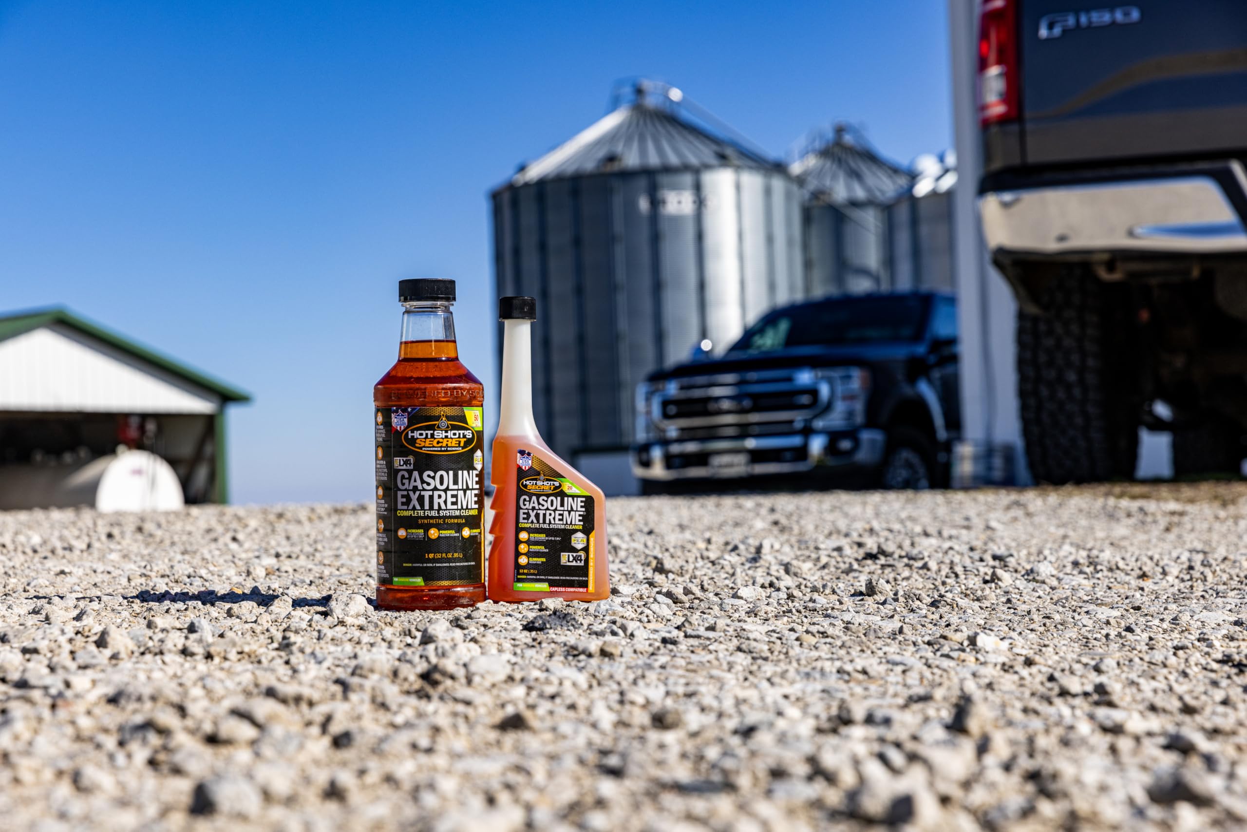 Hot Shot's Secret 32 oz bottle next to a measuring cup to show accurate sizing