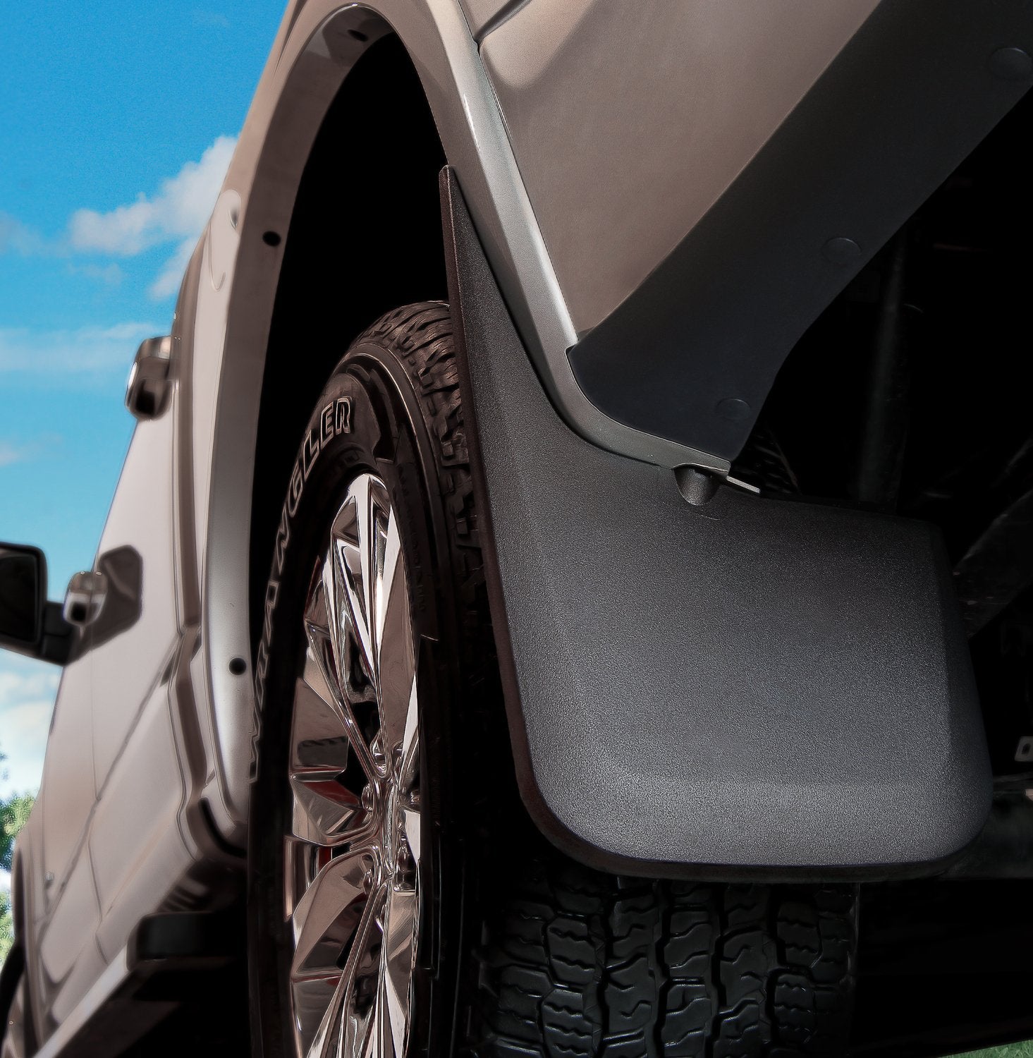Husky Liners installed rear wheel coverage showing debris control benefit