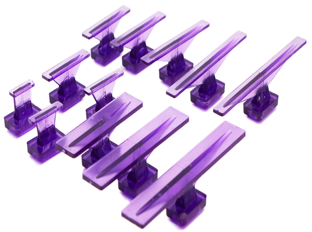 Hyamass tabs spread on workbench offering multiple sizes and shapes