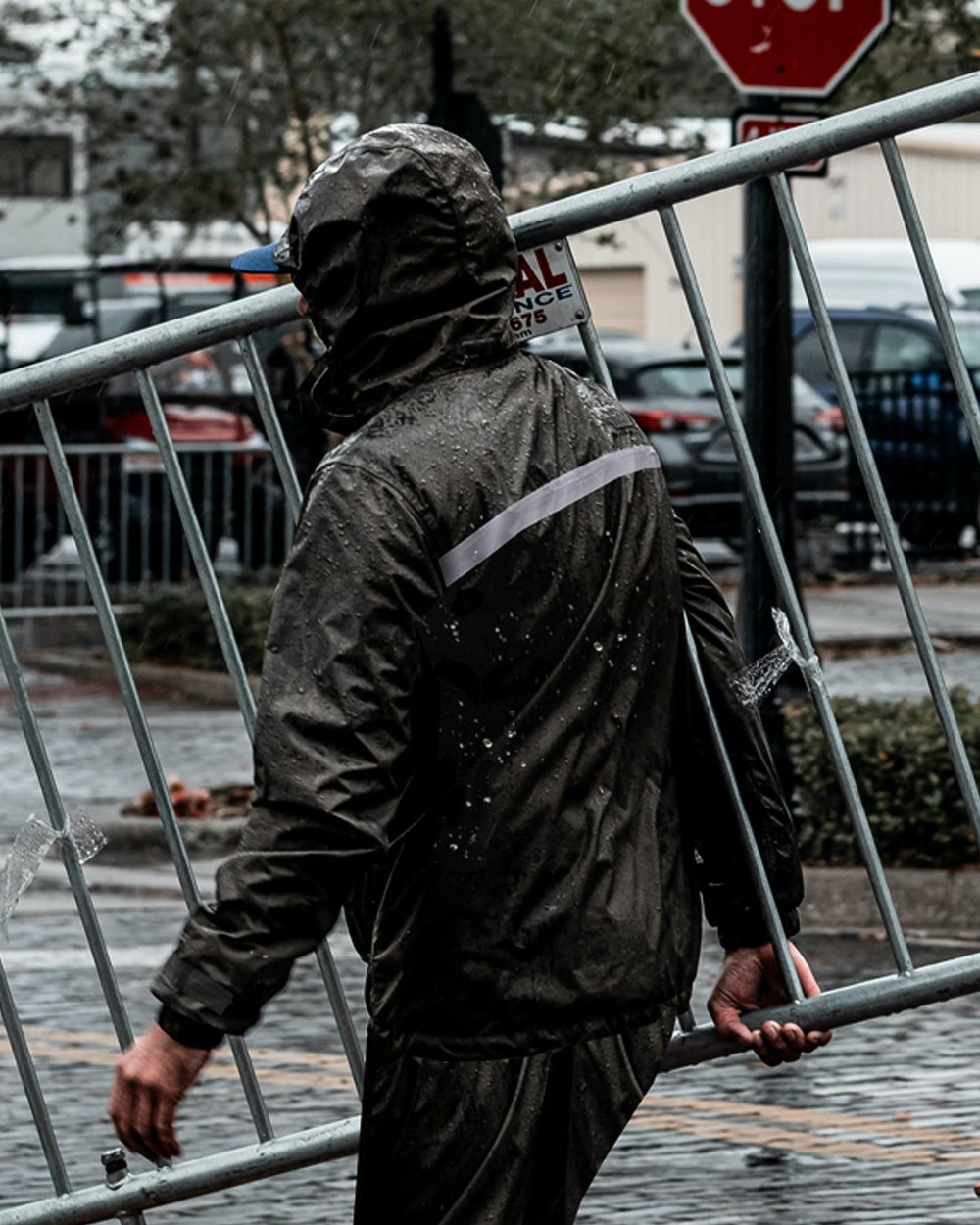 iCreek raincoat on commuter showing practical everyday use