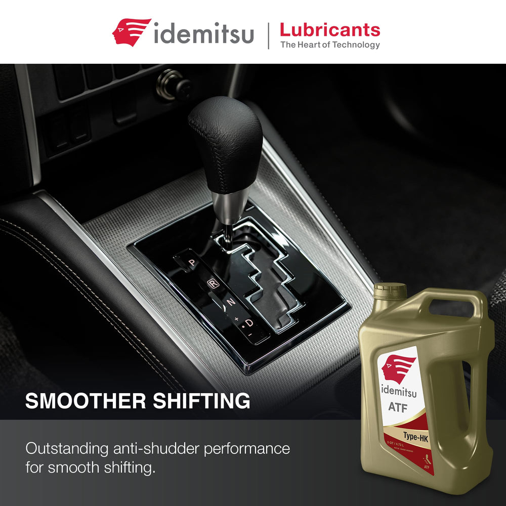 Pouring Idemitsu ATF Type HK into a funnel for a clean transmission top-up