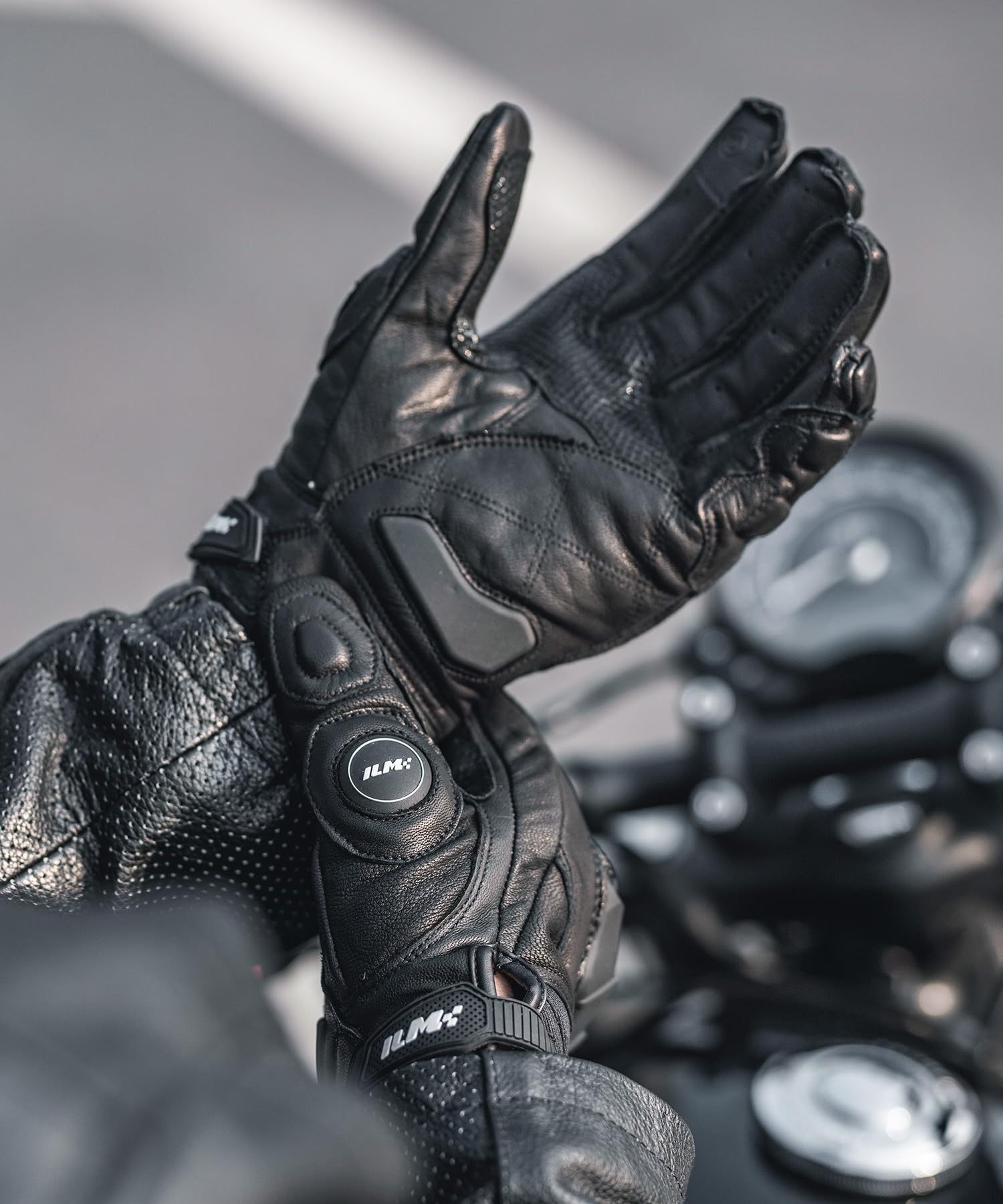 ILM gloves worn by rider in urban setting for comfortable ventilation