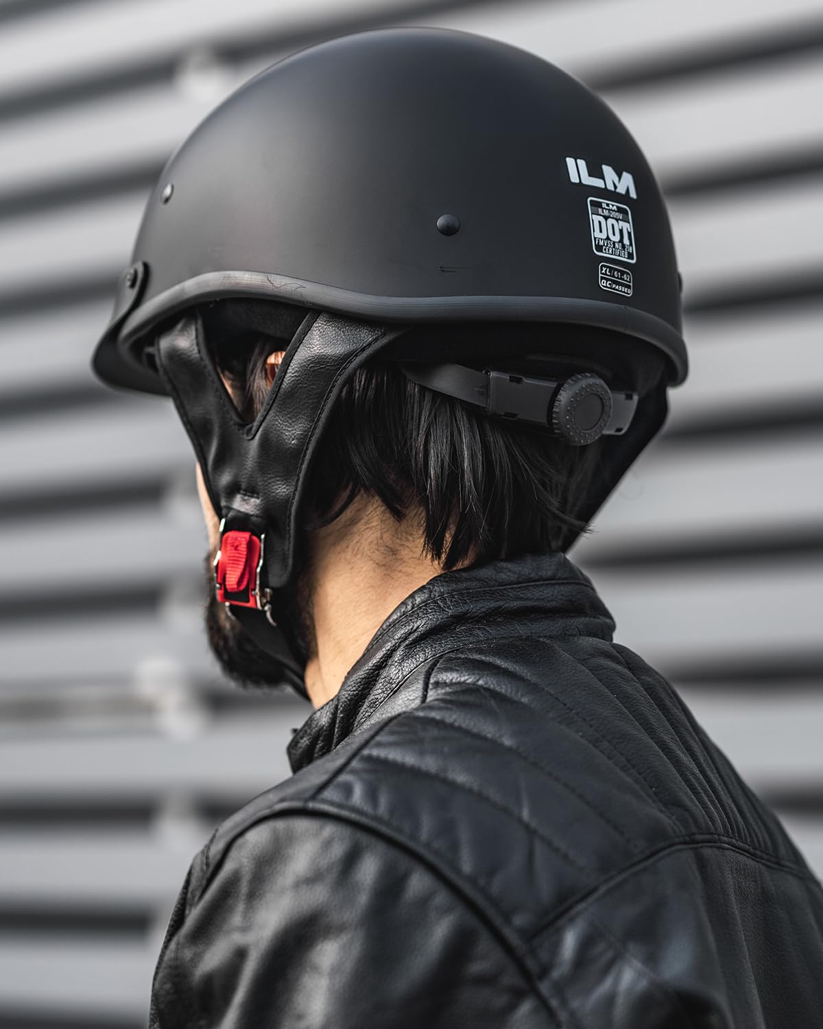 ILM helmet worn by rider in city demonstrating everyday commuter protection benefit
