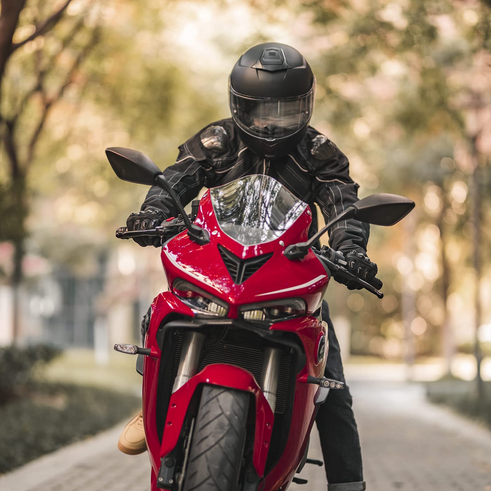 ILM helmet on motorcycle demonstrating real-world fit and riding confidence benefit