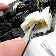Innovative Products of America demonstrating cleaning both male blade and female socket for reliable contact