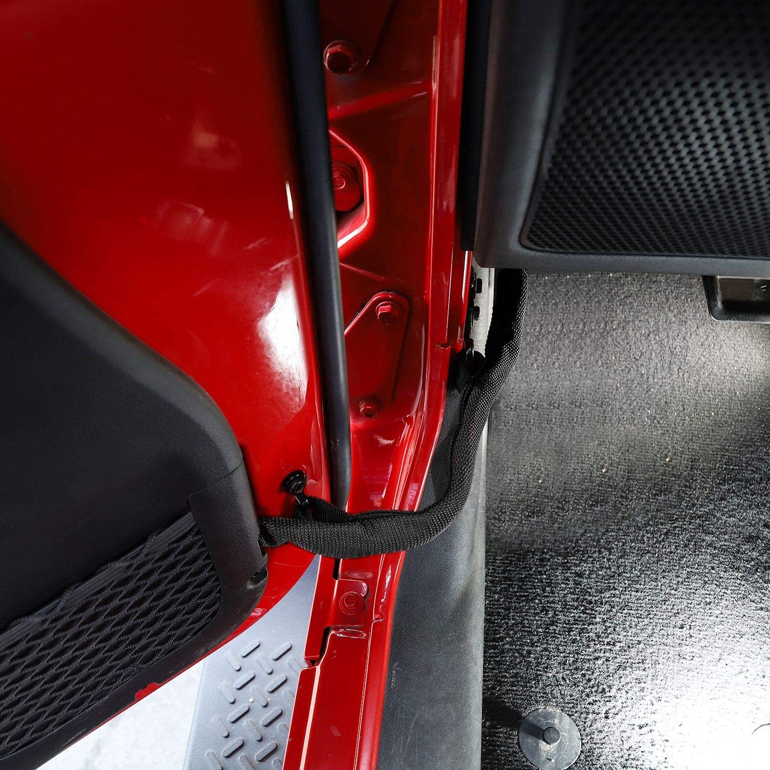 JeCar on parked Jeep in tight space showing protection from door dings