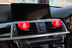Jelly Belly mounted on car vent demonstrating simple clip-on installation benefit