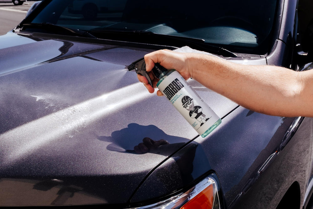 Jimbos application microfiber wipe demonstration showing streak-free buffing and fast results