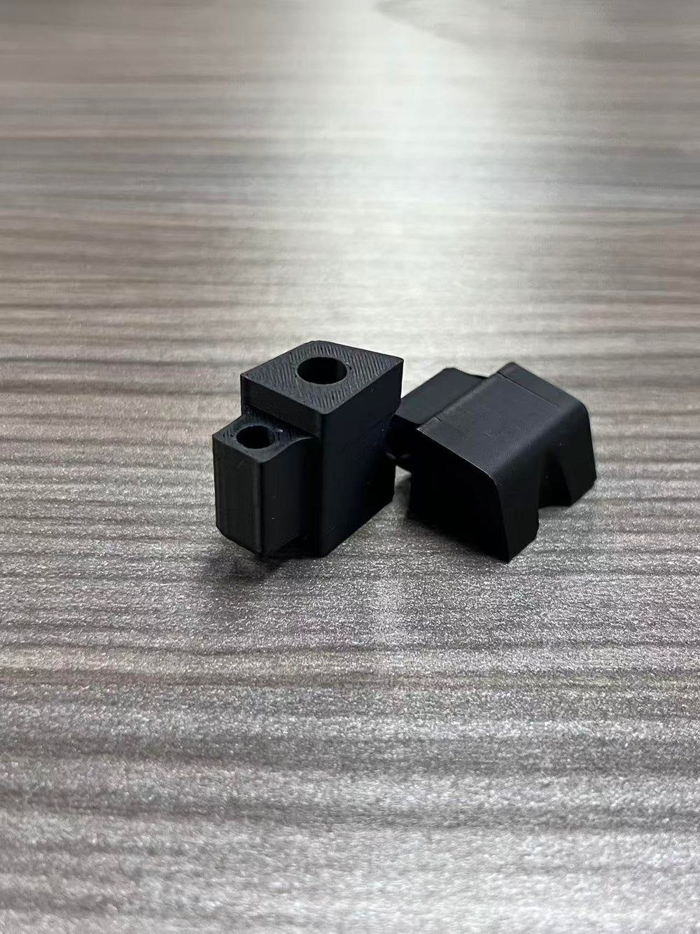 JJKSKV buffer beside ruler showing compact size and fitment benefit