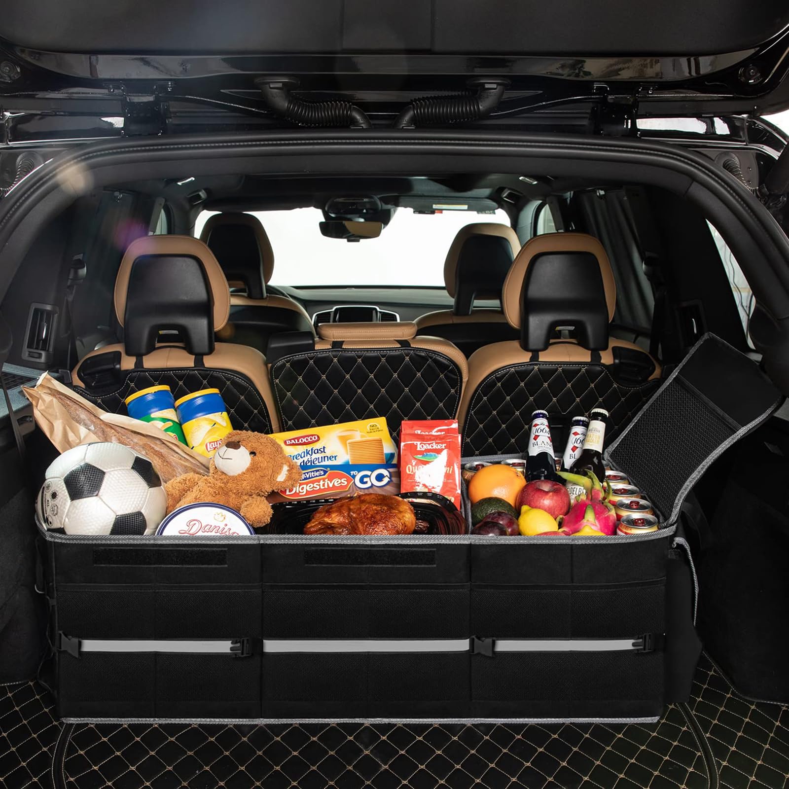 Jorindes lifestyle shot in SUV trunk organizing groceries and picnic gear