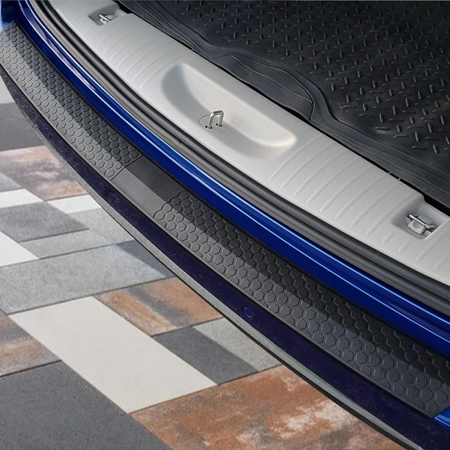 Kefly guard during luggage loading highlighting paint protection benefit