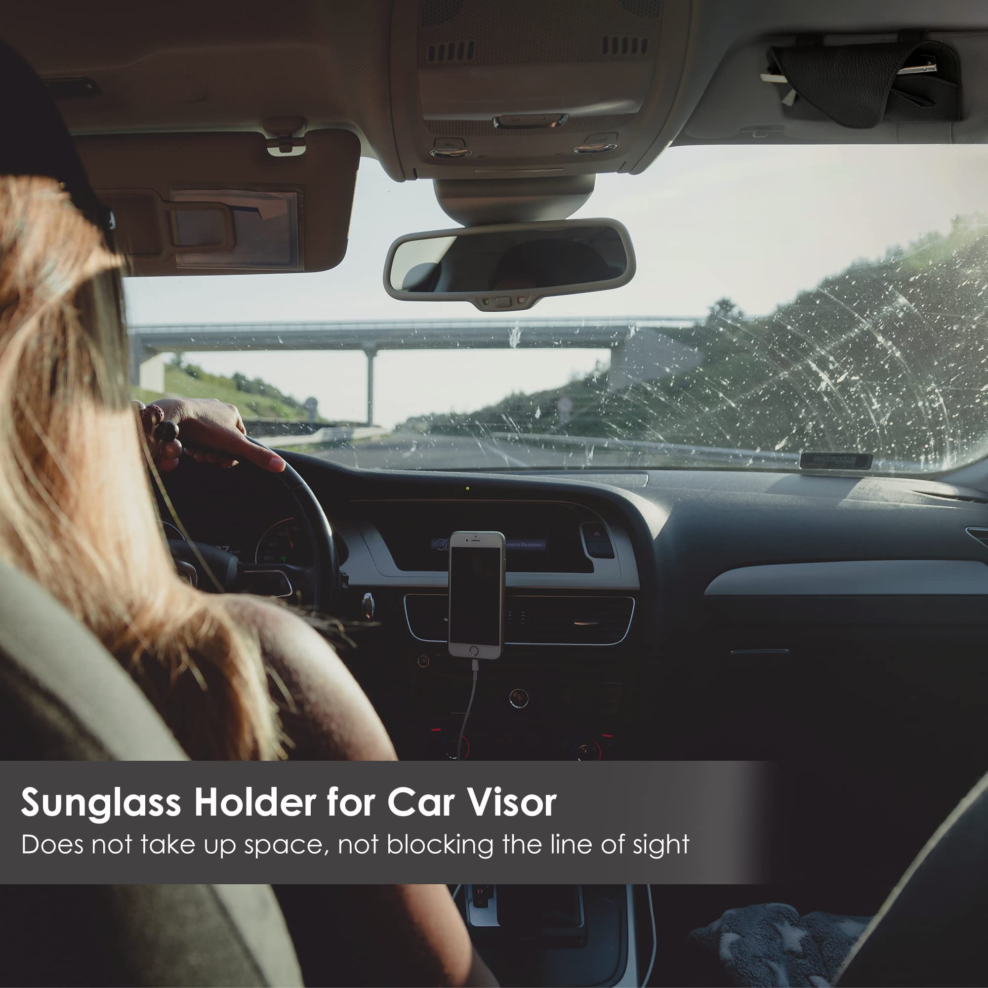 KEVANCHO with sunglasses inside illustrating organized in-car storage
