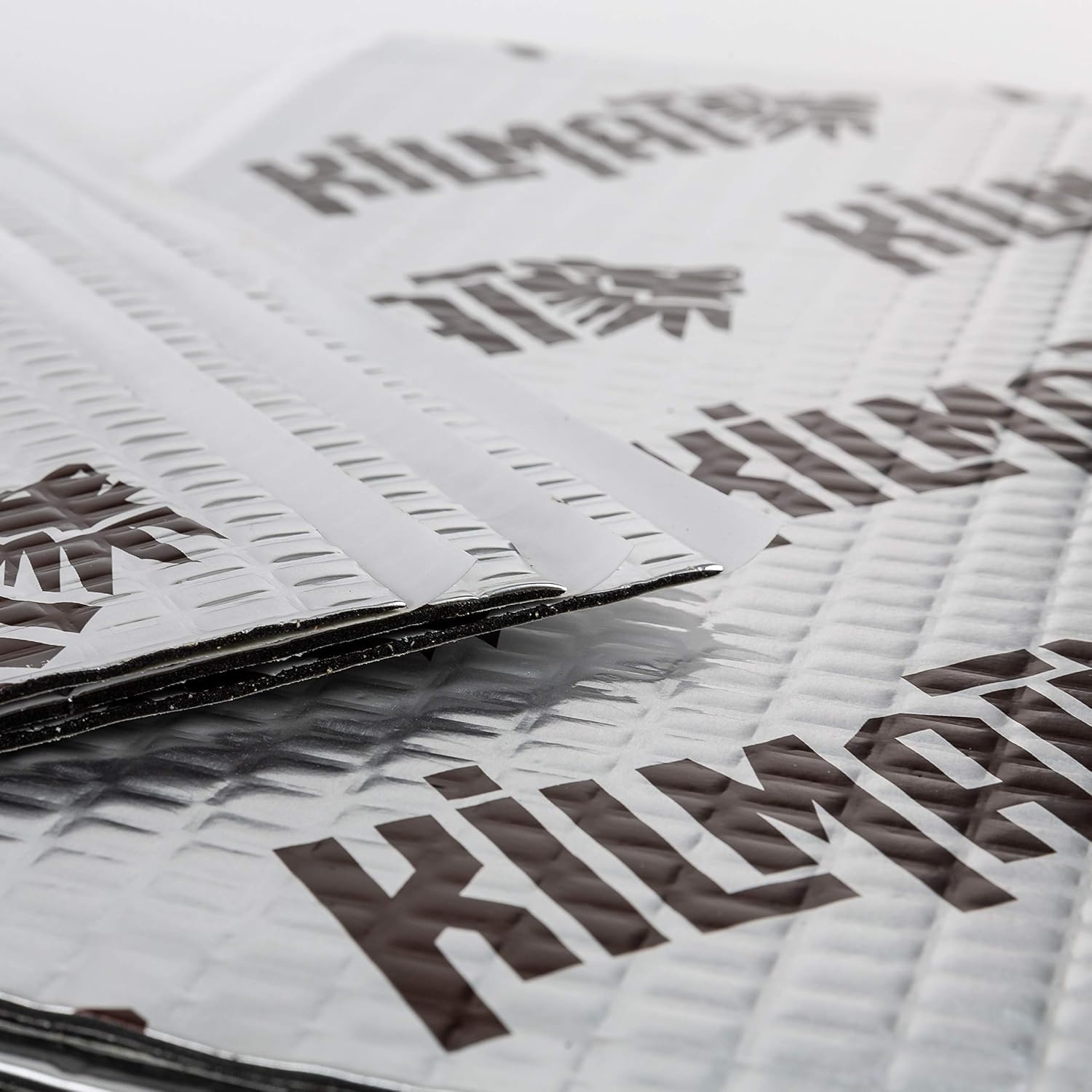 KILMAT installed on car floor reducing road noise and vibration