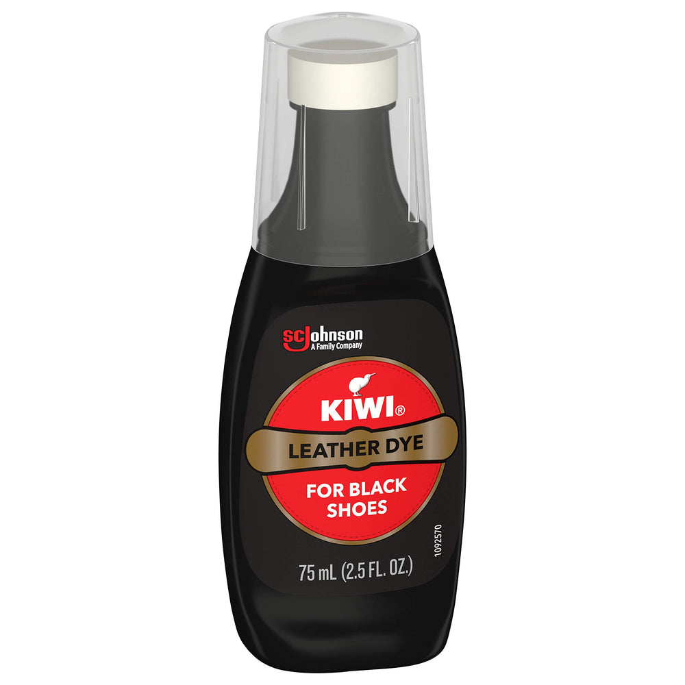 SC Johnson KIWI 2.5 oz bottle beside a coin to show compact travel-friendly size