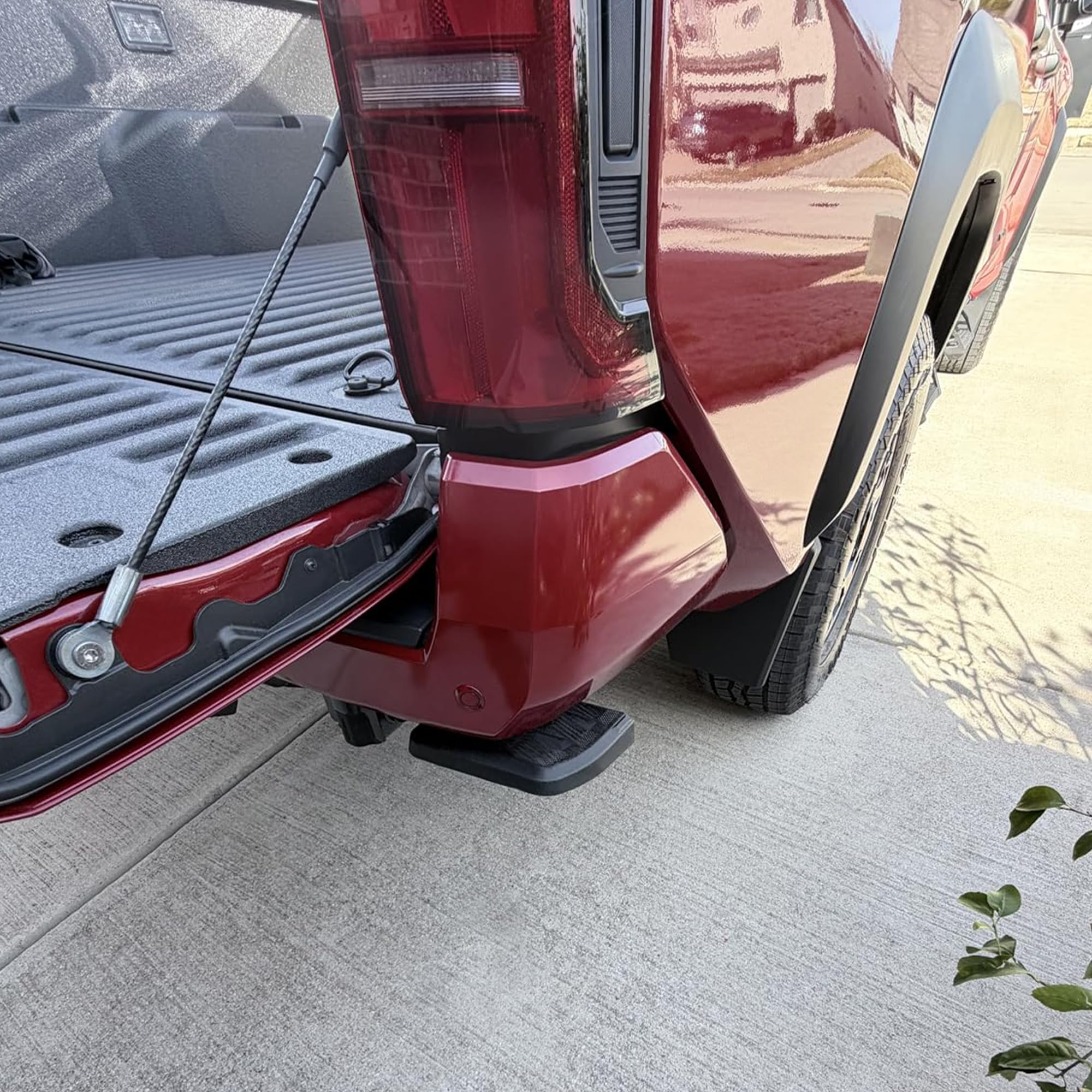KLN tailgate step lifestyle shot with groceries loaded for everyday convenience