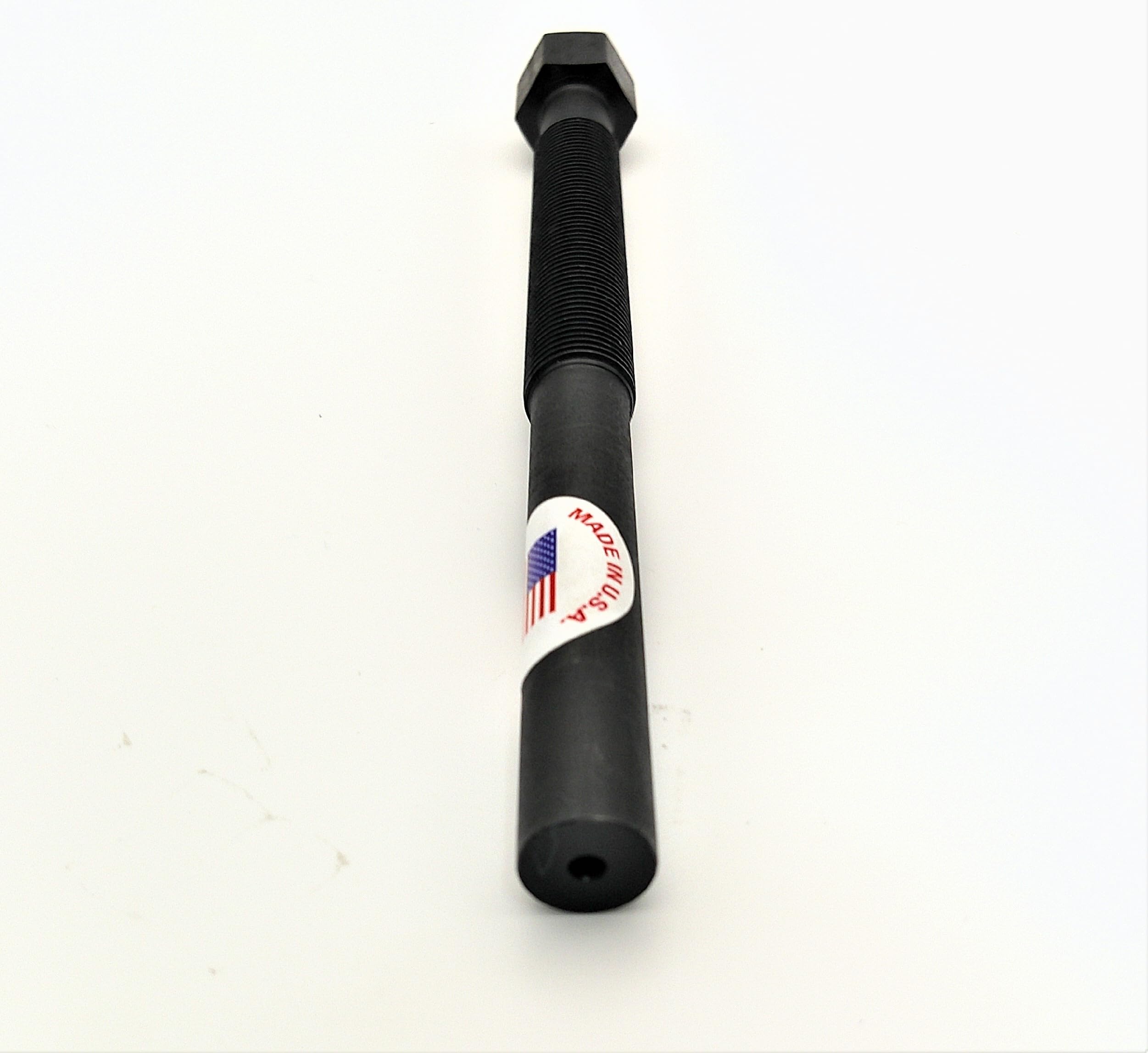 KNS Performance alongside ruler showing compact size and durable construction