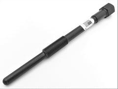 KNS Performance puller beside ruler showing compact size and fit