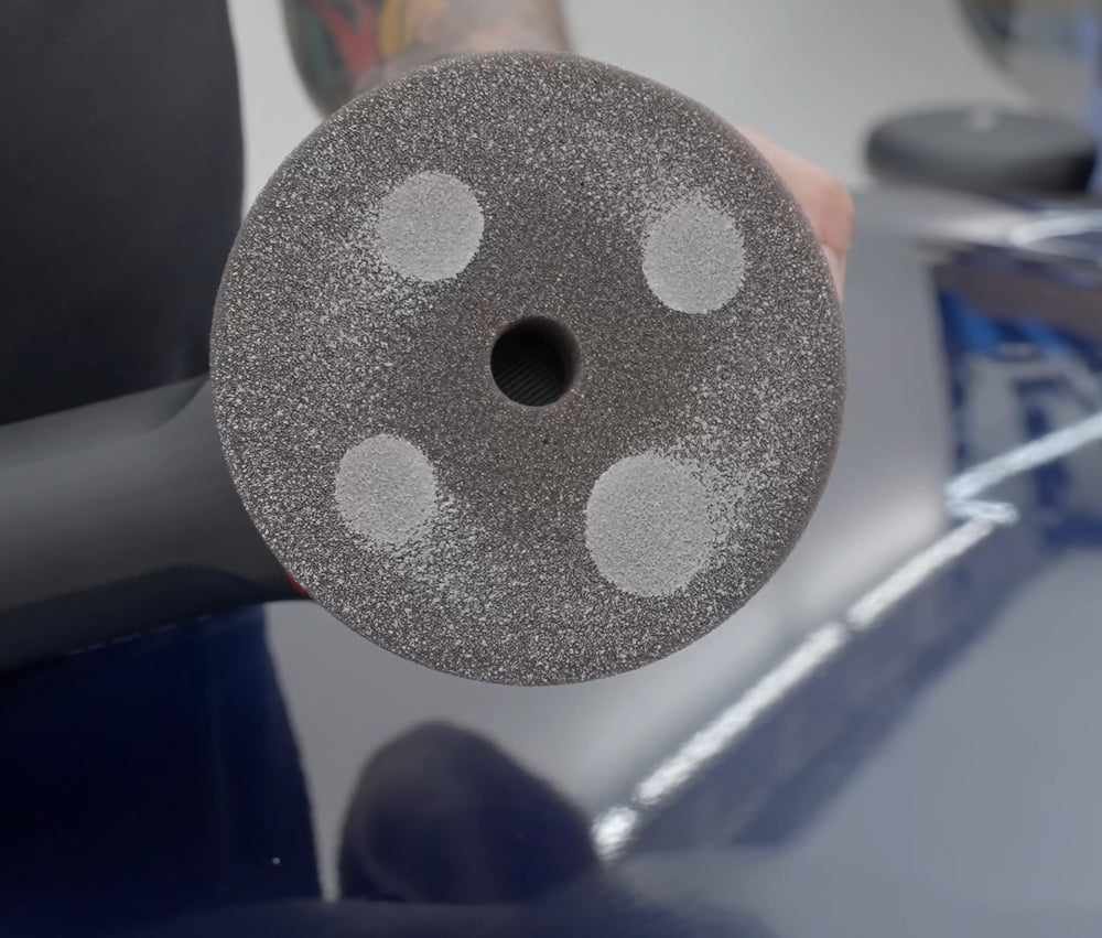 KOCHCHEMIE pad mounted on polisher demonstrating low torsion and controlled handling