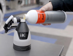 KOCHCHEMIE spraying cleaner onto wheel for fast brake dust removal benefit